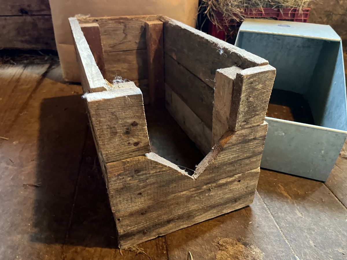 A homemade style of meat rabbit nest box