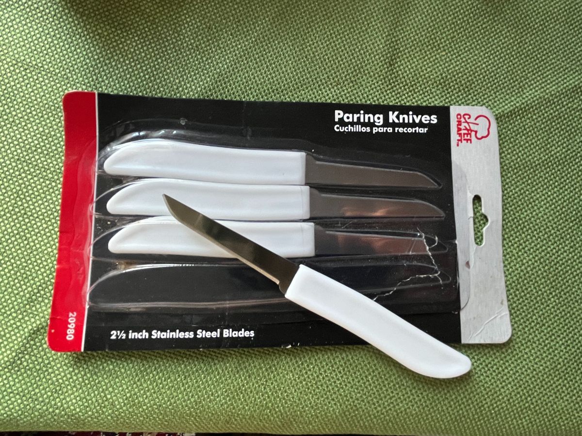 A set of kitchen paring knives