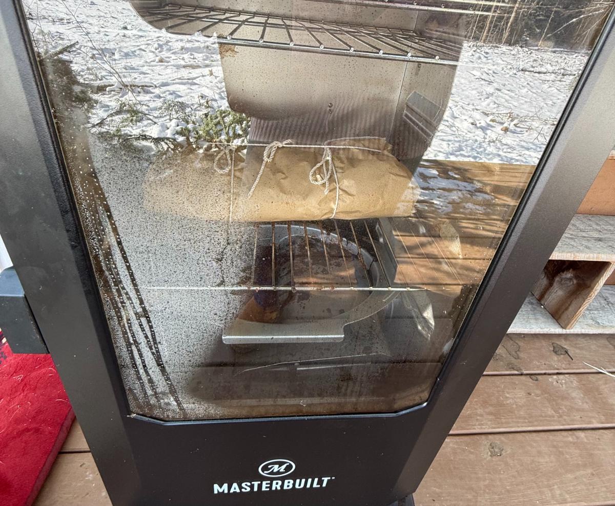 Rabbit meat in a smoker