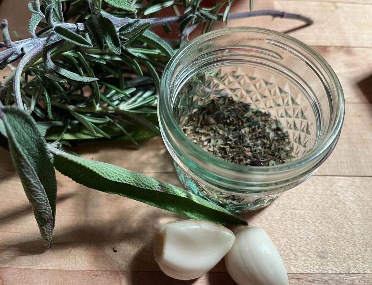 Fresh herbs and garlic for meat rabbit brine recipe