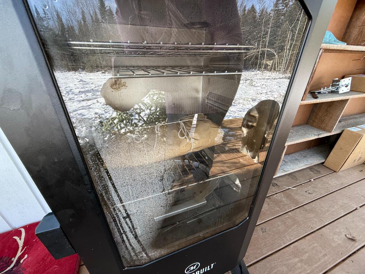 Rabbit meat in a smoker