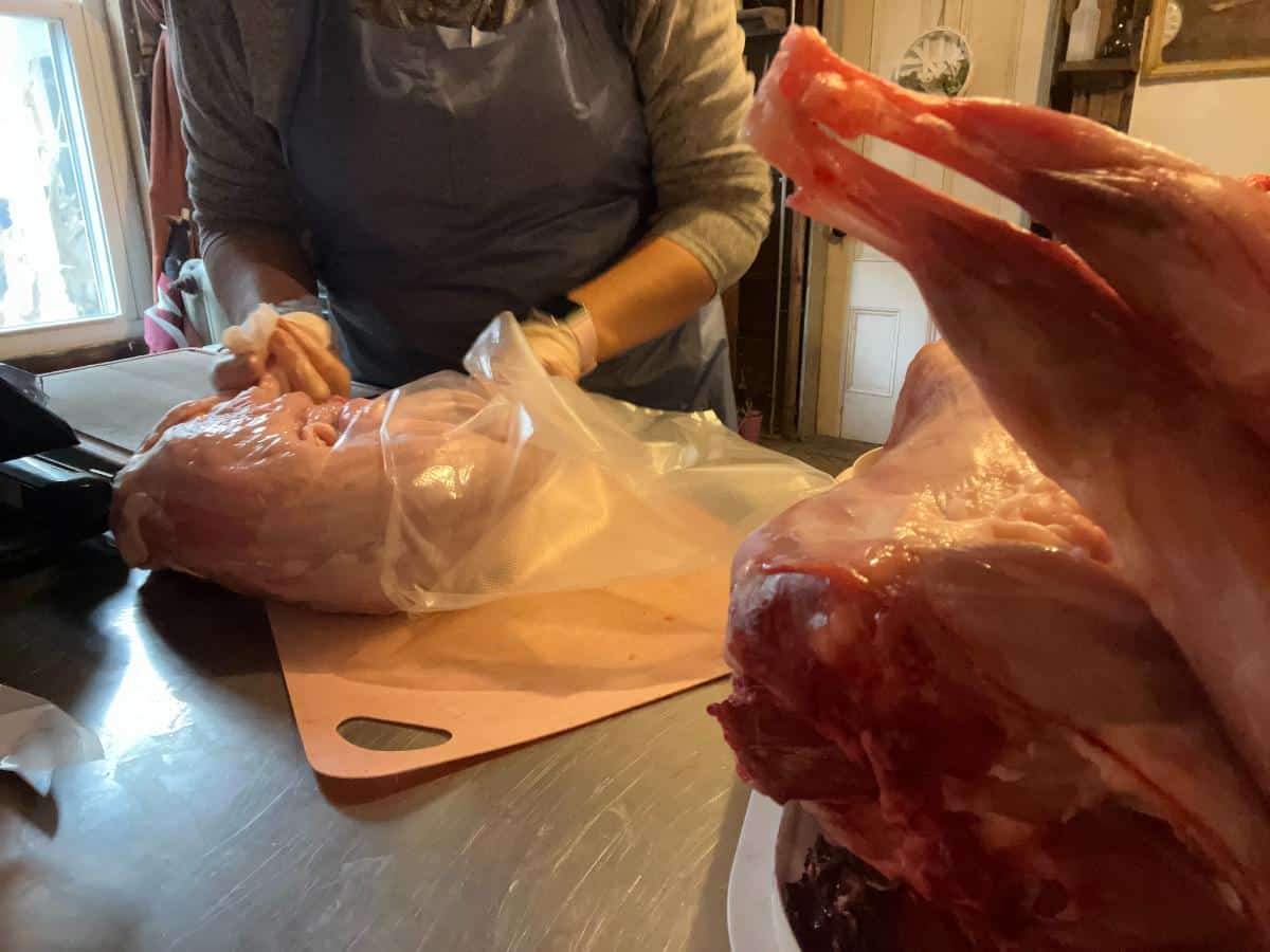 Meat preparation on a kitchen counter.